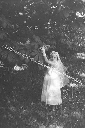 CARMEL BOWERS AT ALPHONOUS COURT DRUMCONDRA ON HER FIRST COMMUNION WAY CATH MARIE